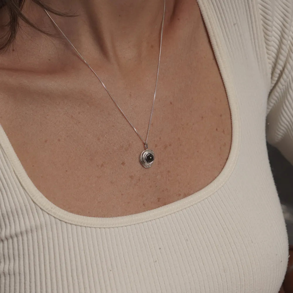 CADENA NIDO GRIS